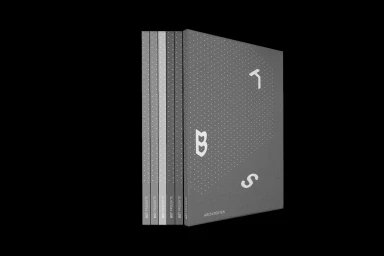 A set of five grey architectural books with dotted patterns and white typography against a black background.