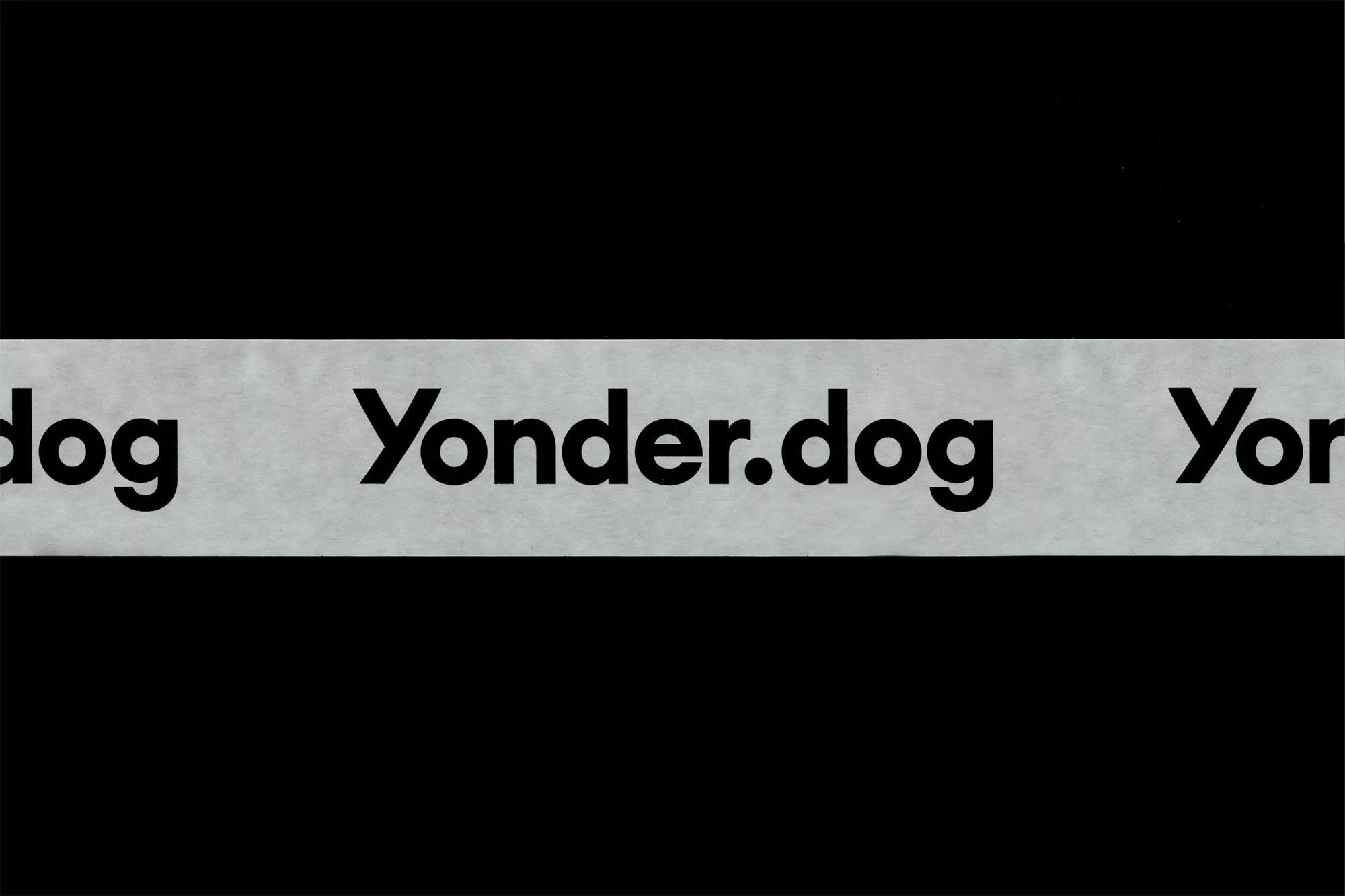 Text graphic on black background featuring the website 'Yonder.dog' on a gray banner, suitable for various digital design projects.
