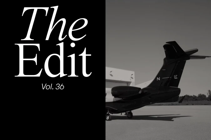 Monochrome photograph featuring half of a jet on a runway juxtaposed with text "The Edit Vol. 36" against a black background.