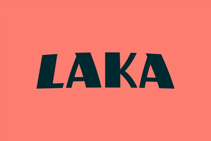 The word 'LAKA' in bold, dark teal lettering against a solid light coral background. Simple, clean graphic design with strong color contrast.