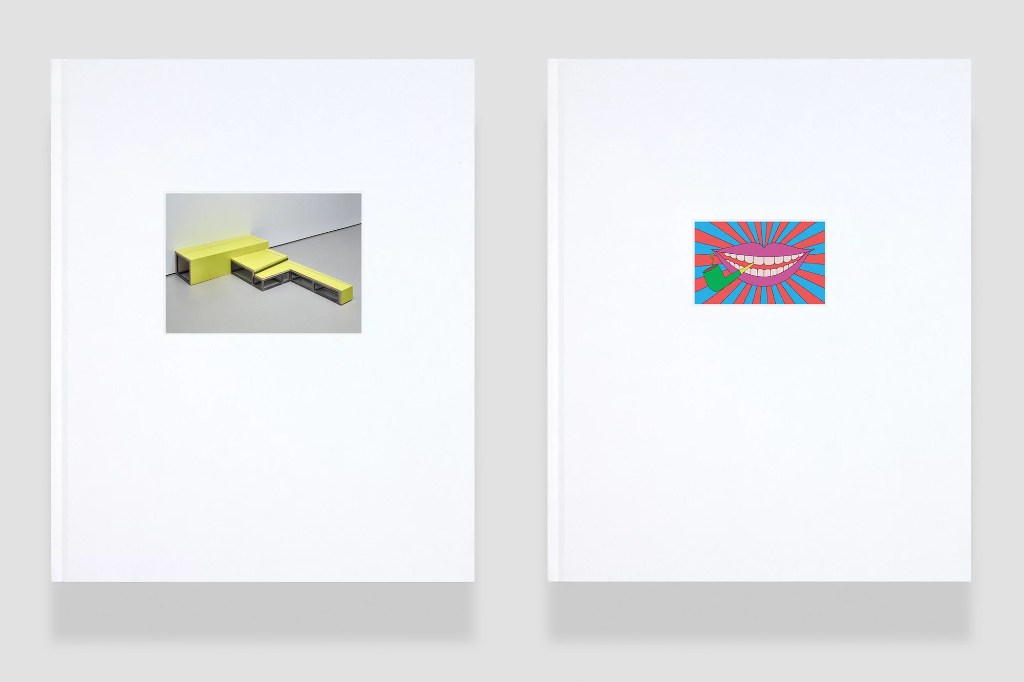 Two white books with graphic design imagery: one shows geometric yellow shapes, and the other shows a pop-art mouth graphic.