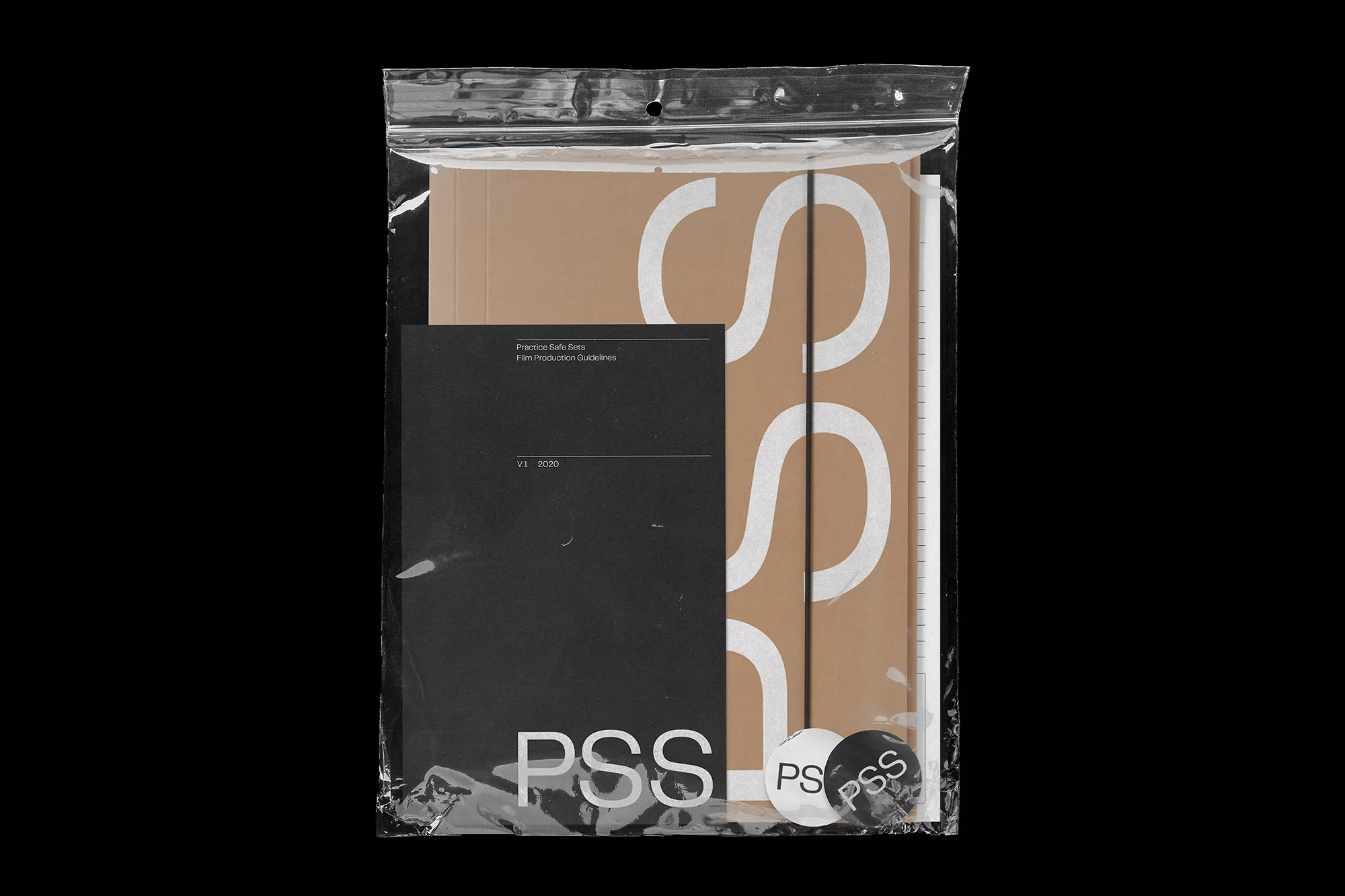 Graphic design features a clear plastic bag containing a presentation set with the text "PSS" in a black and tan color scheme.