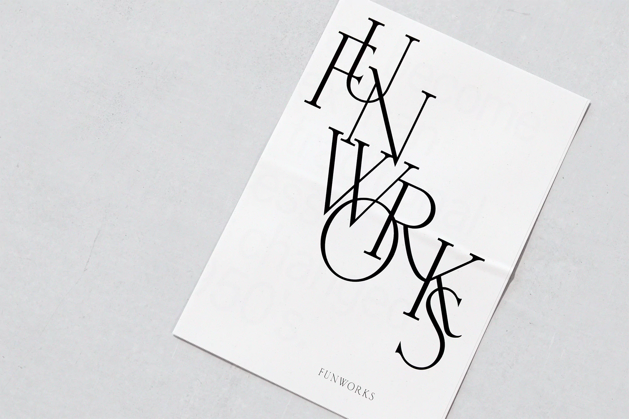 Funworks branding material featuring bold, stylized typography on a minimalist white background, creating a modern and eye-catching design.
