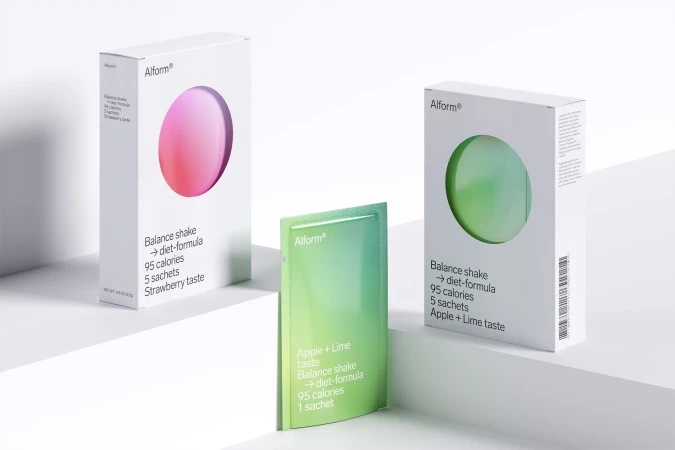 Product shot of Alform balance shake diet formula in strawberry and apple-lime flavors, featuring the product boxes and individual sachet.