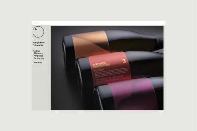 Web design portfolio layout showing three wine bottles with modern paper labels against a dark background