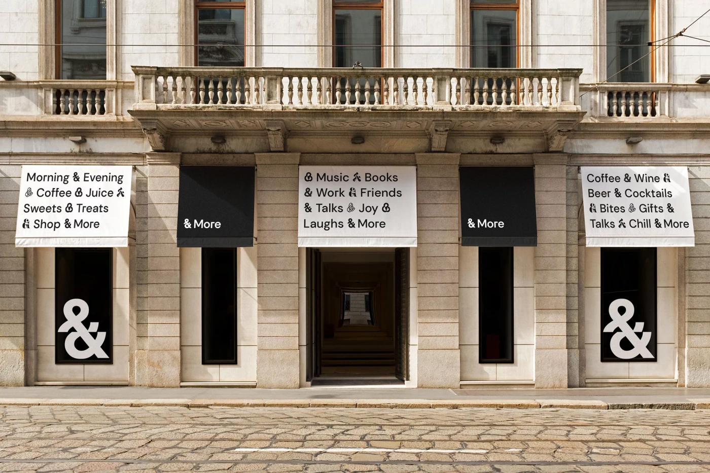 Classical stone building exterior featuring branded awnings and large street-level windows with ampersand graphics for Sheraton