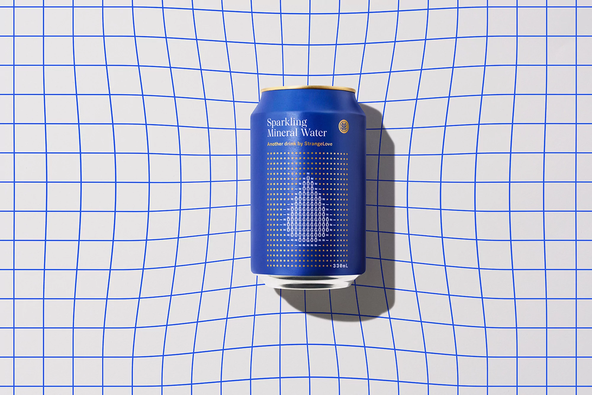 A blue can of StrangeLove sparkling mineral water with a gold lid is isolated on a white background with a blue grid pattern.