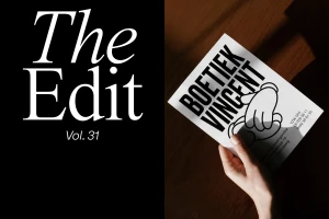 A hand holding a white card with Boetiek Vincent typography next to a black panel with white text reading The Edit Vol. 31.