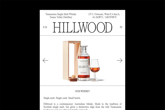 Still life featuring a bottle of Hillwood single malt whisky, presented with a wooden box and a tasting glass, evoking sophistication.