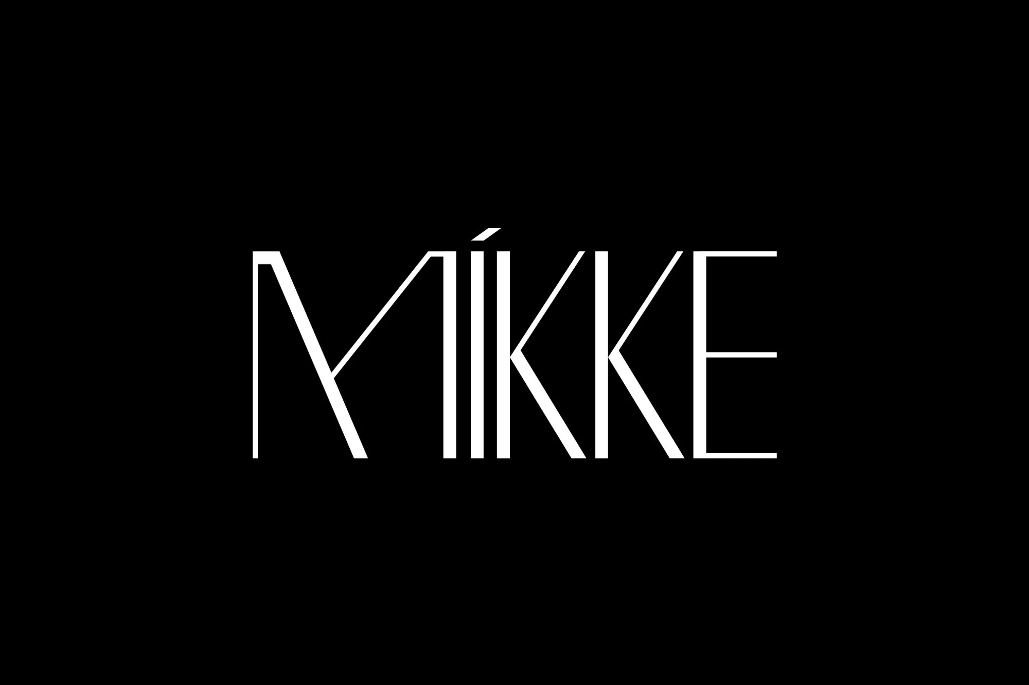Elegant white sans-serif typography of the word "MÍKKE" against a solid black background; clean, modern design.
