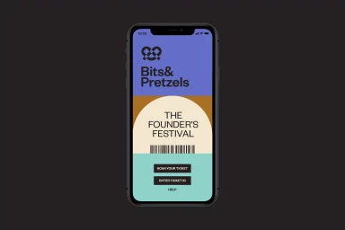 Smartphone displaying a branded mobile ticketing app interface for Bits and Pretzels on a dark background.