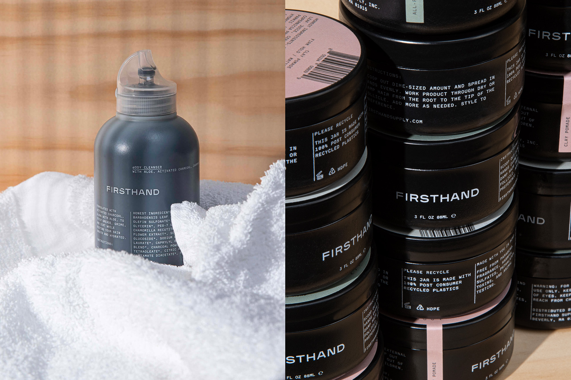 Firsthand Supply dark grey pump bottle nestled in a white towel with a stack of black pomade jars beside it.