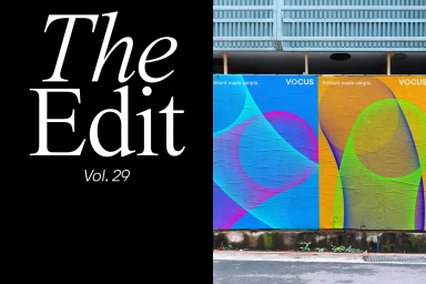 Typography reading The Edit Vol. 29 on black beside Vocus brand posters with colorful abstract graphic patterns on a wall