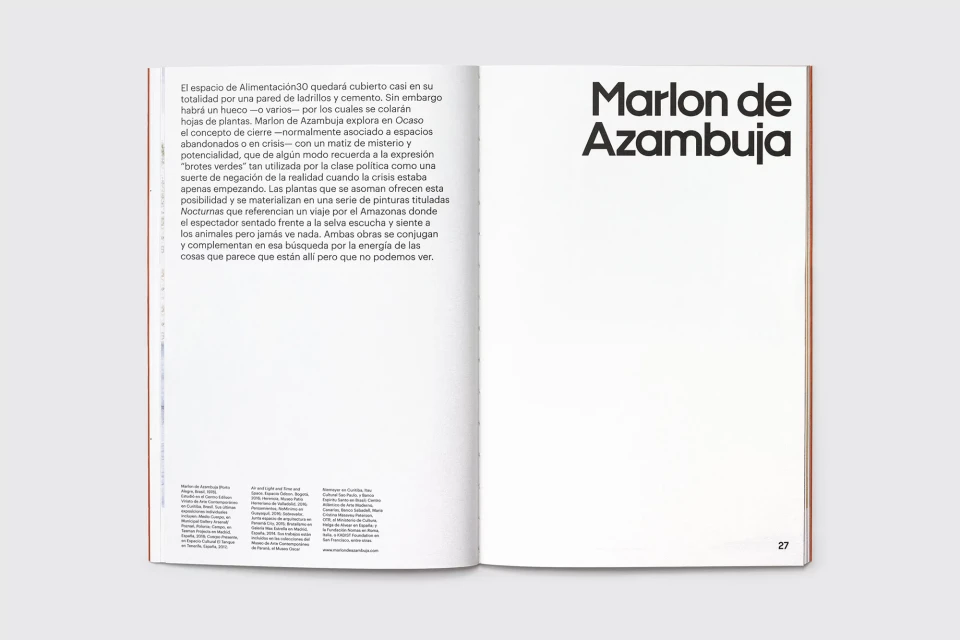 Open magazine spread featuring text in Spanish, with the name Marlon de Azambuja displayed prominently in black font on the right page.
