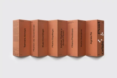 Folded accordion brochure in terracotta orange paper featuring black typography set against a neutral white background