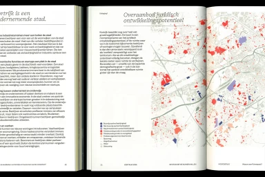 Open book layout featuring typography text columns on the left and a coloured map graphic on the right page.