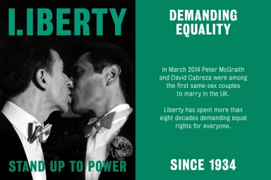 Two men in tuxedos kissing in a black and white photograph alongside bold green text branding for Liberty.