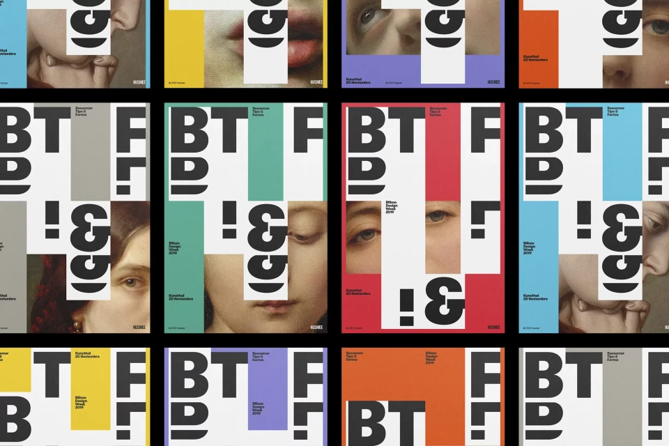 Arrangement of art posters featuring a black and white geometric design with color blocks and partial portraits of people on display.