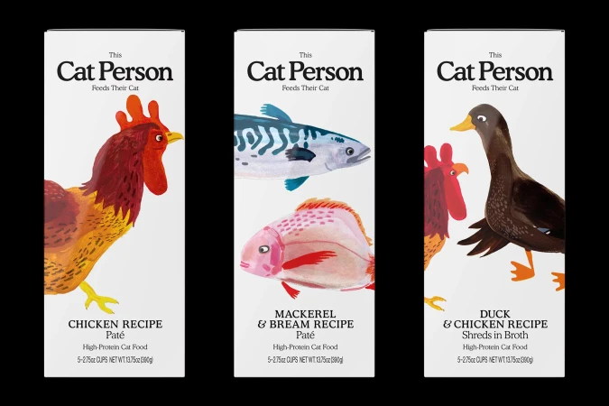Three packages of Cat Person cat food in white packaging with illustrated images of chicken, fish, and duck recipes. High-protein.