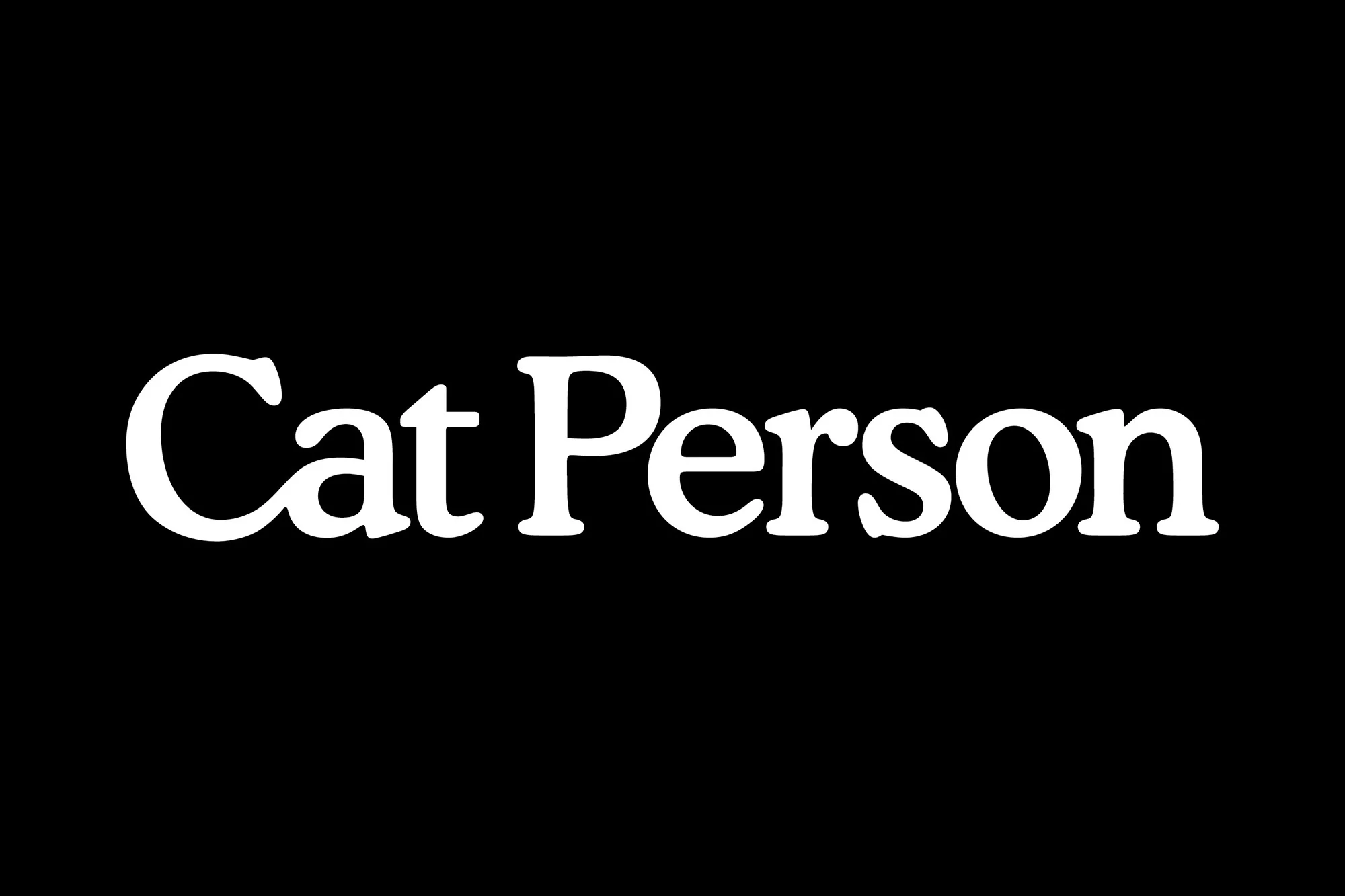 Image features the text "Cat Person" in white against a black background, creating a simple and direct textual composition.