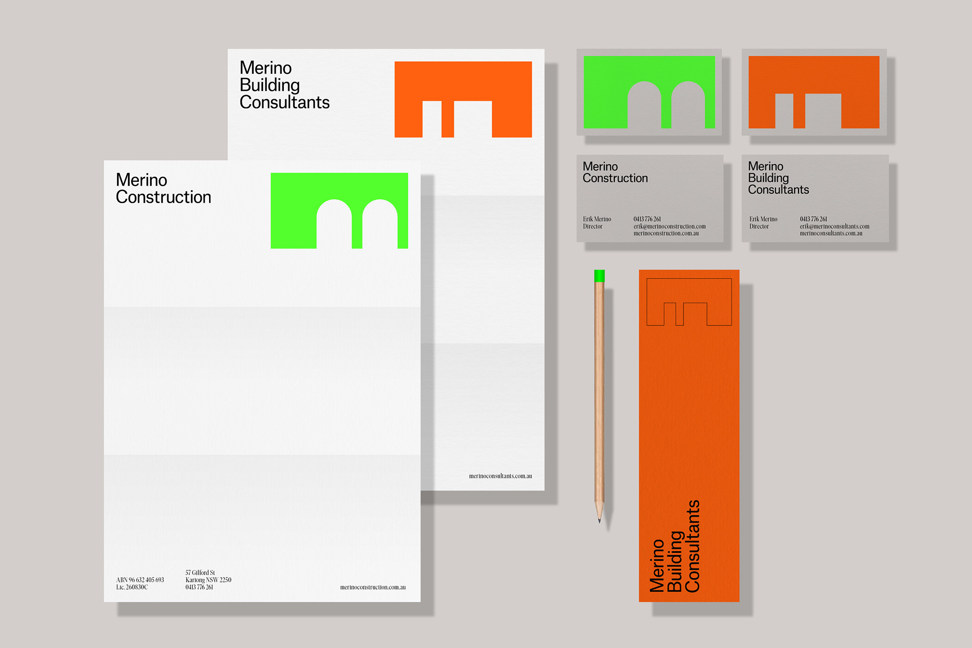 Stationery set featuring business cards, letterhead, and a bookmark with modern geometric logo designs in bright orange and green hues.