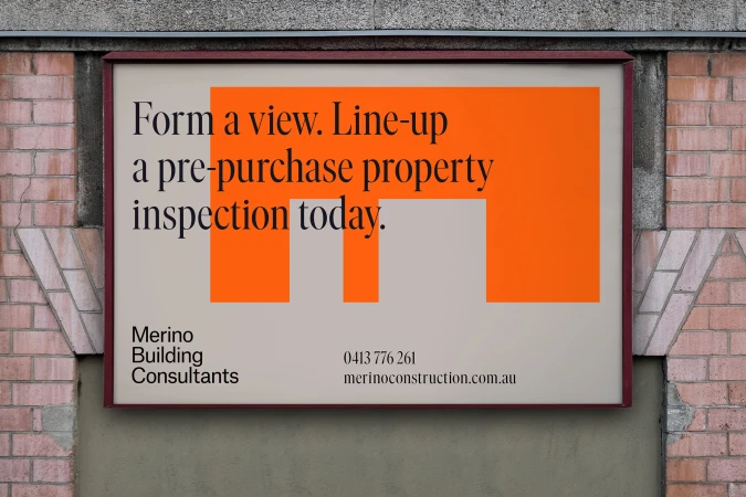Real estate advertisement featuring an orange graphic element and black text promoting property inspections, framed on a textured wall.