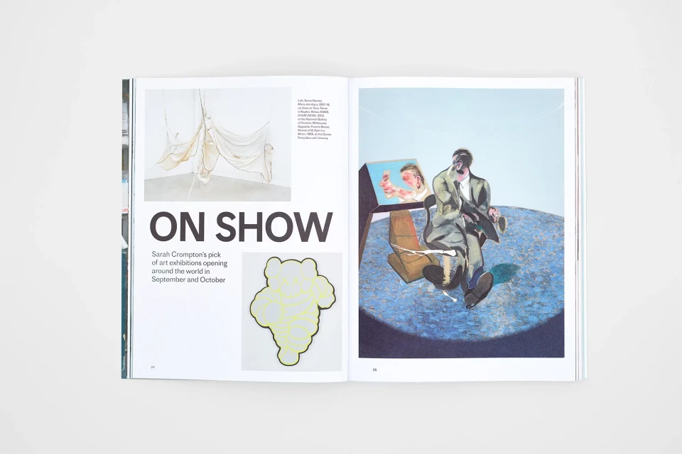 Magazine spread showcases modern art with paintings of human figures in suits and abstract hanging textile art in a gallery setting.