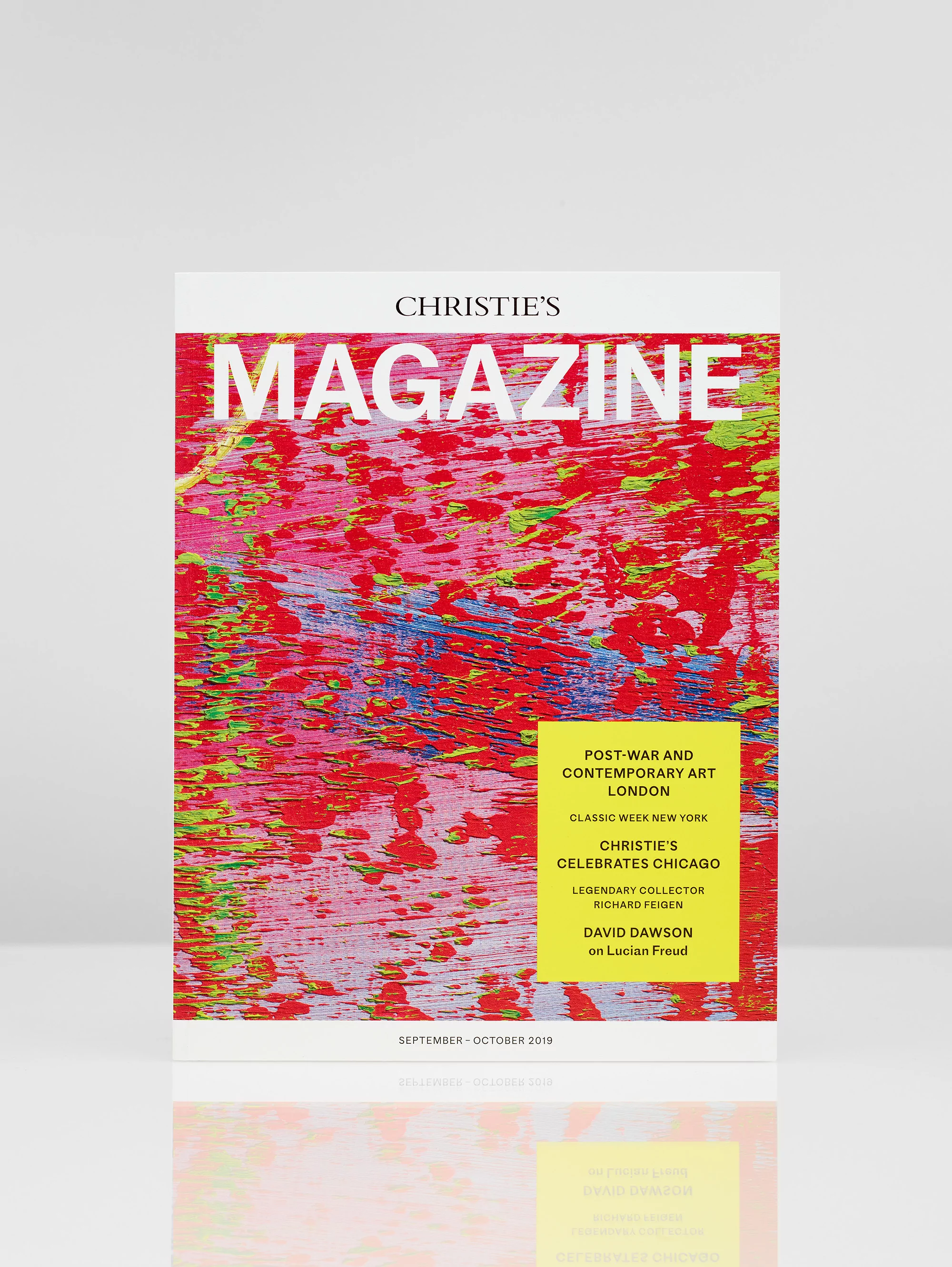 Christie's Magazine cover featuring abstract painting in red, pink, and blue, with text overlay, and reflective surface.