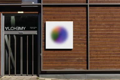Alchemy storefront exterior featuring horizontal wood slats and a sign with a blurred colorful gradient orb graphic