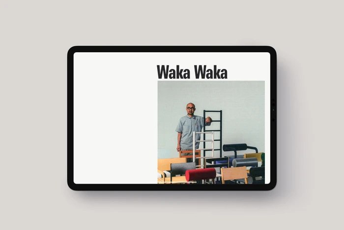 Digital tablet displaying a web page for Waka Waka brand identity featuring furniture design