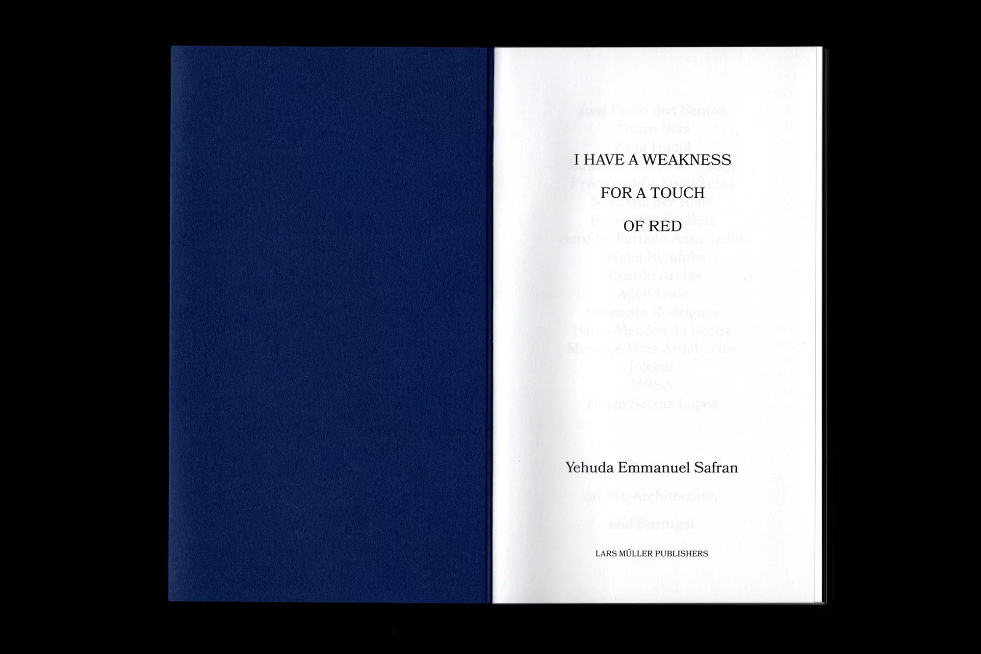 Open book with a dark blue inner cover opposite a white page featuring the text 'I have a weakness for a touch of red'.