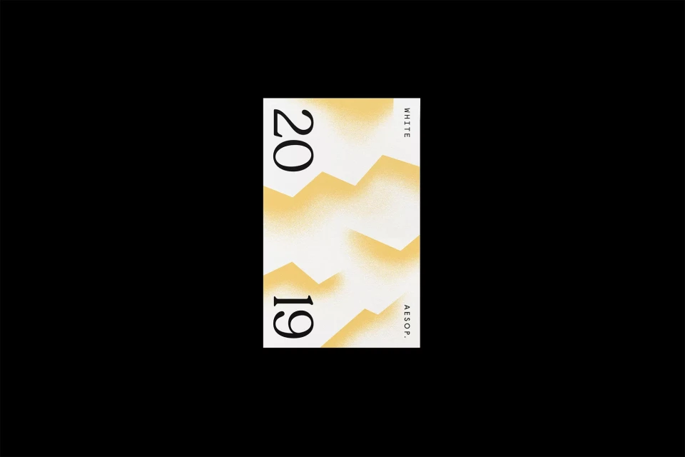 Minimalist graphic design with overlapping white and yellow geometric shapes on a white background, surrounded by black negative space.