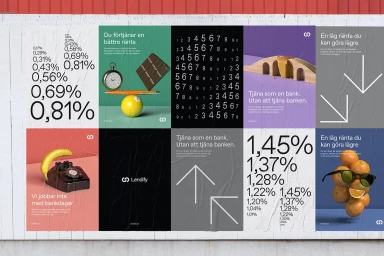 Billboards displaying a brand identity project with bold typography, percentages, and surreal object compositions.