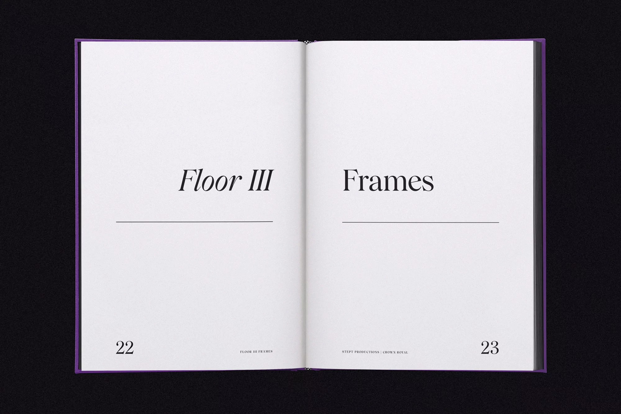 Open book with 'Floor III' on the left page and 'Frames' on the right page against a black background, showcasing typography and design.