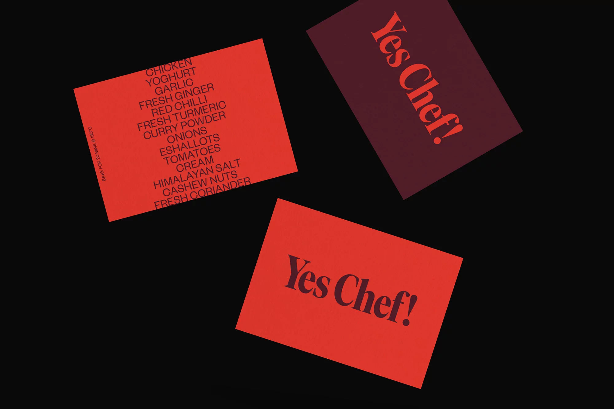 Geometric food photography: Recipe cards with ingredient list and 'Yes Chef!' text on a stark black backdrop, showcasing culinary design.