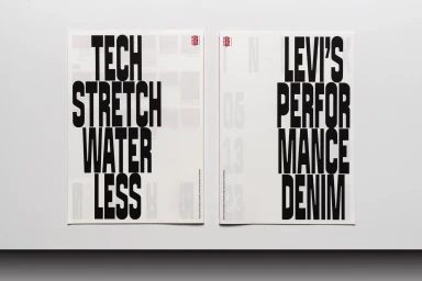 Two white posters featuring bold black typography reading Tech Stretch Water Less and Levi s Performance Denim.