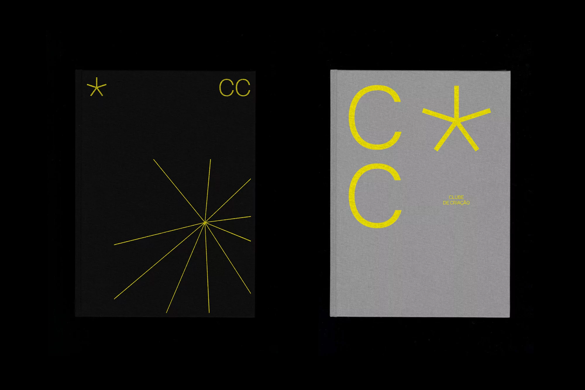Two graphic design book covers, one black with a geometric starburst and the other gray with bold yellow lettering and a star.