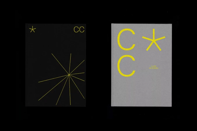 Two graphic design book covers, one black with a geometric starburst and the other gray with bold yellow lettering and a star.