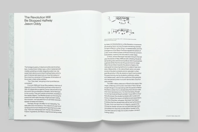 Open book spread features text excerpts and architectural sketches in black and white, providing a glimpse into its content.