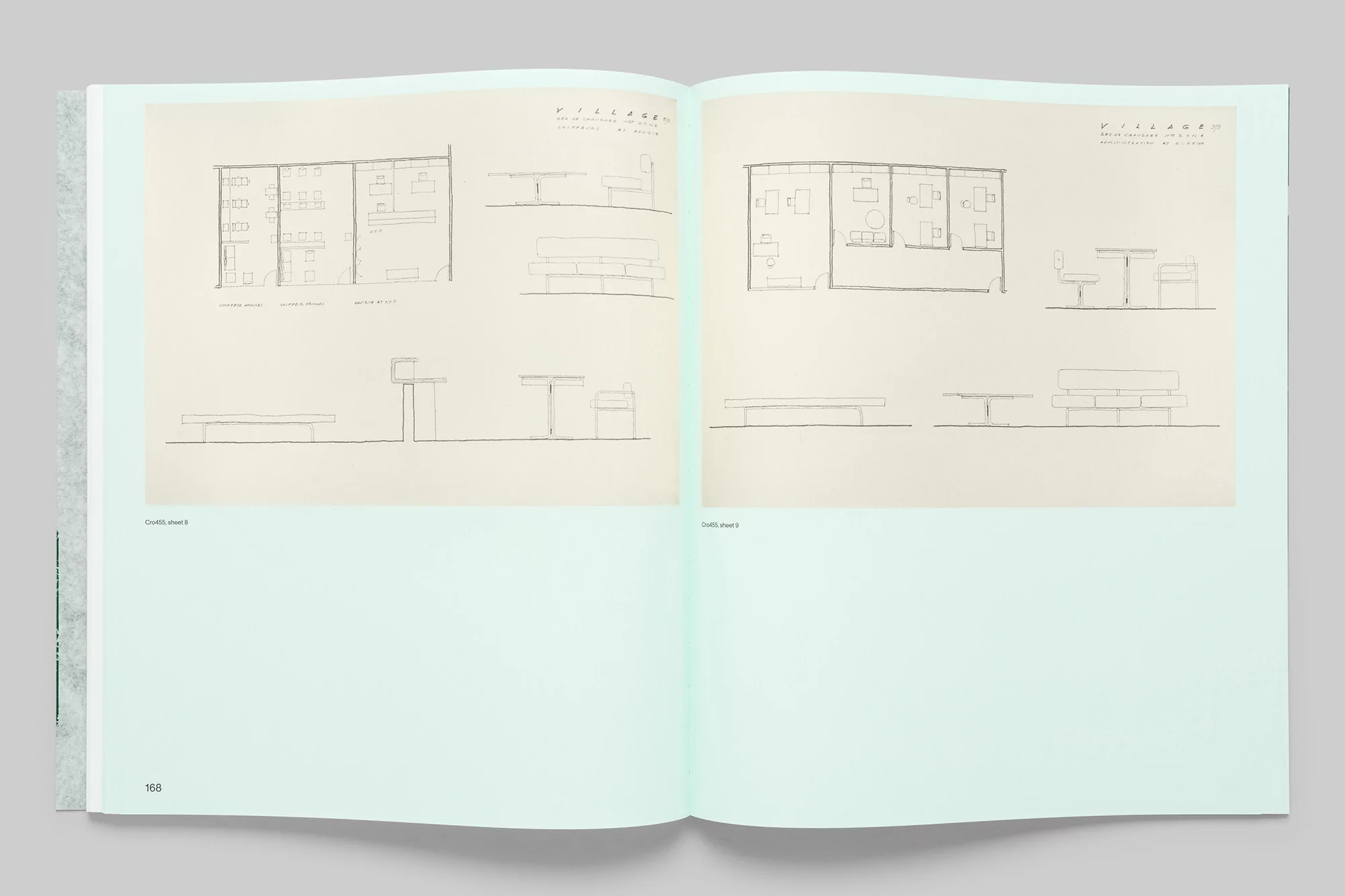 Open book displaying architectural drawings with floor plans and furniture layouts in a light and airy presentation.