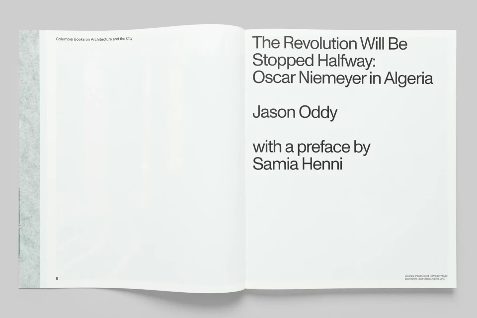 Open book displays title 'The Revolution Will Be Stopped Halfway: Oscar Niemeyer in Algeria' by Jason Oddy with preface by Samia Henni.