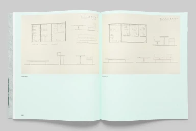 Open book layout displaying architectural floor plans and furniture sketches on pale green pages.