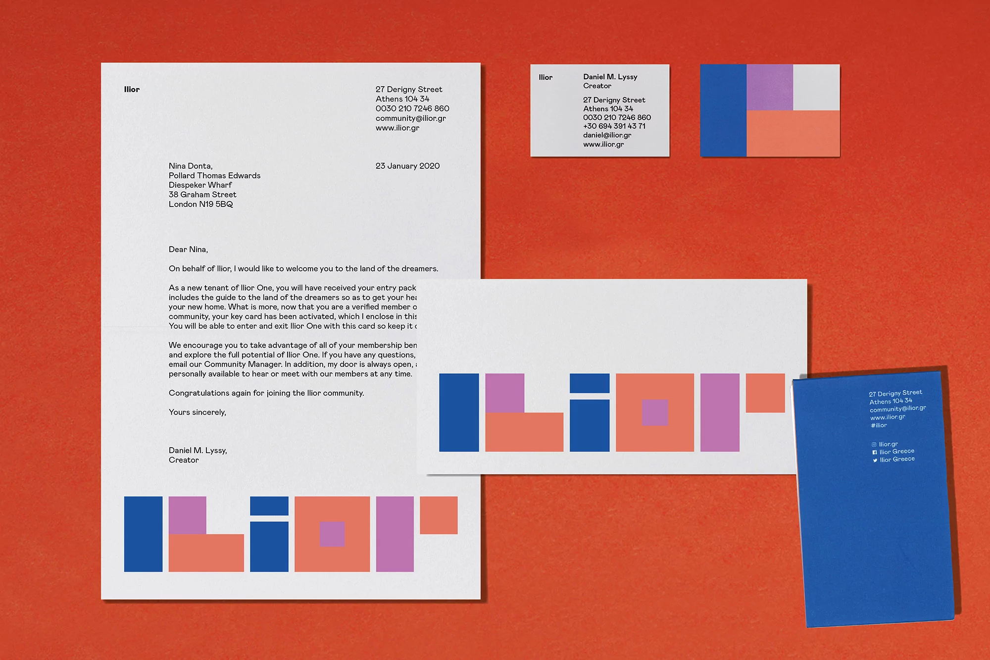 Promotional stationery includes a letter, two cards, and a folded card, all featuring a color block design with the brand name, on red backdrop.