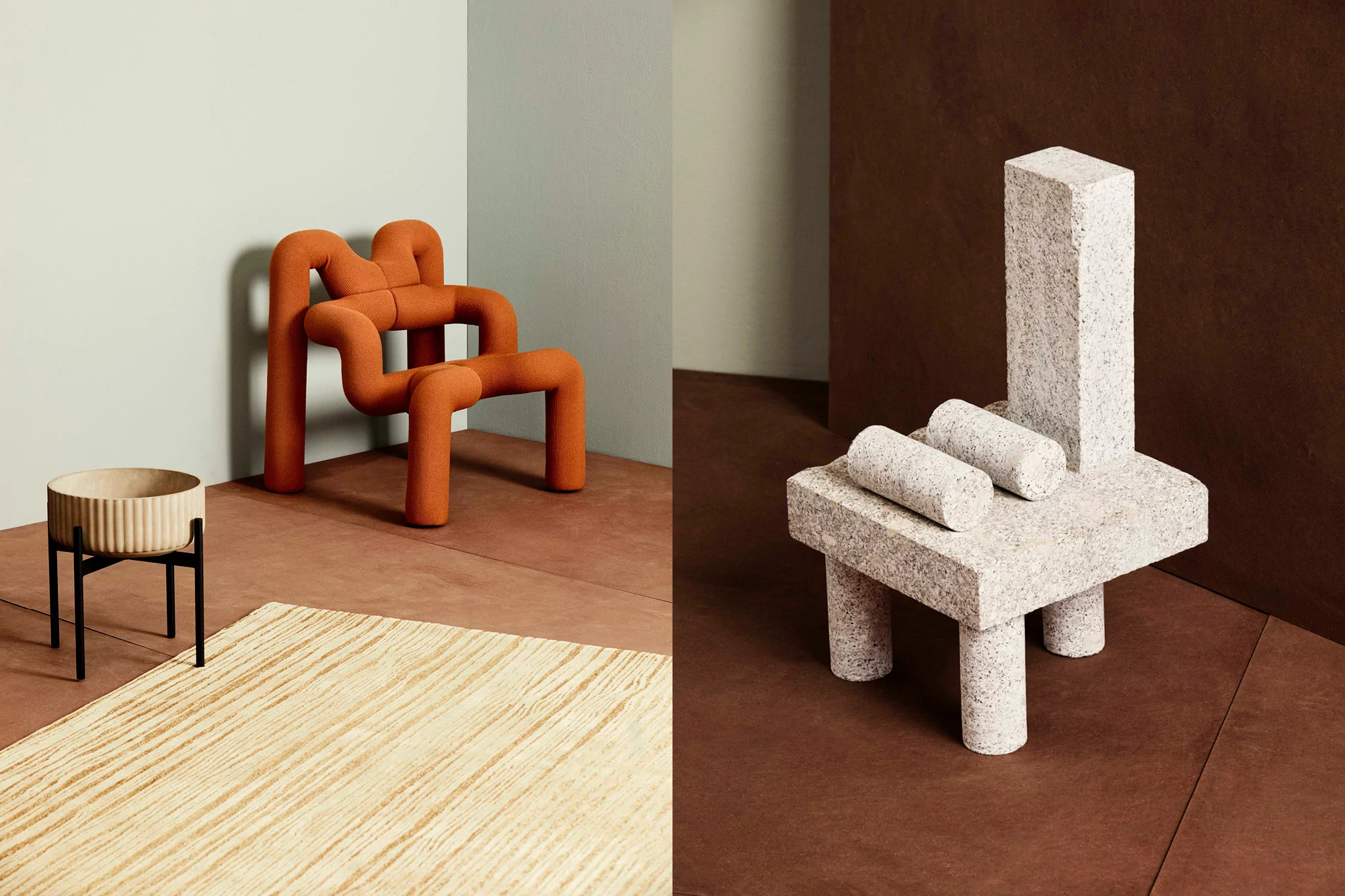 Studio shot of a uniquely-designed orange chair, a concrete chair, a modern planter, and a striped rug creating a minimalist decor.