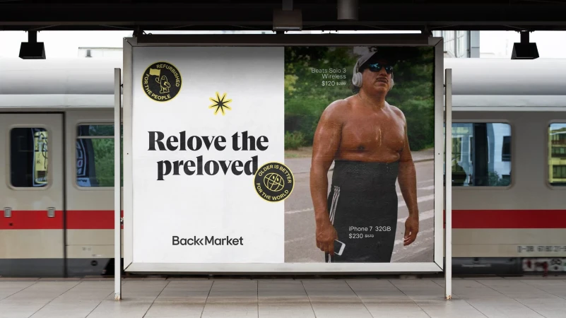 Back Market billboard ad features a sweaty adult male in sunglasses posing next to text promoting refurbished electronics.