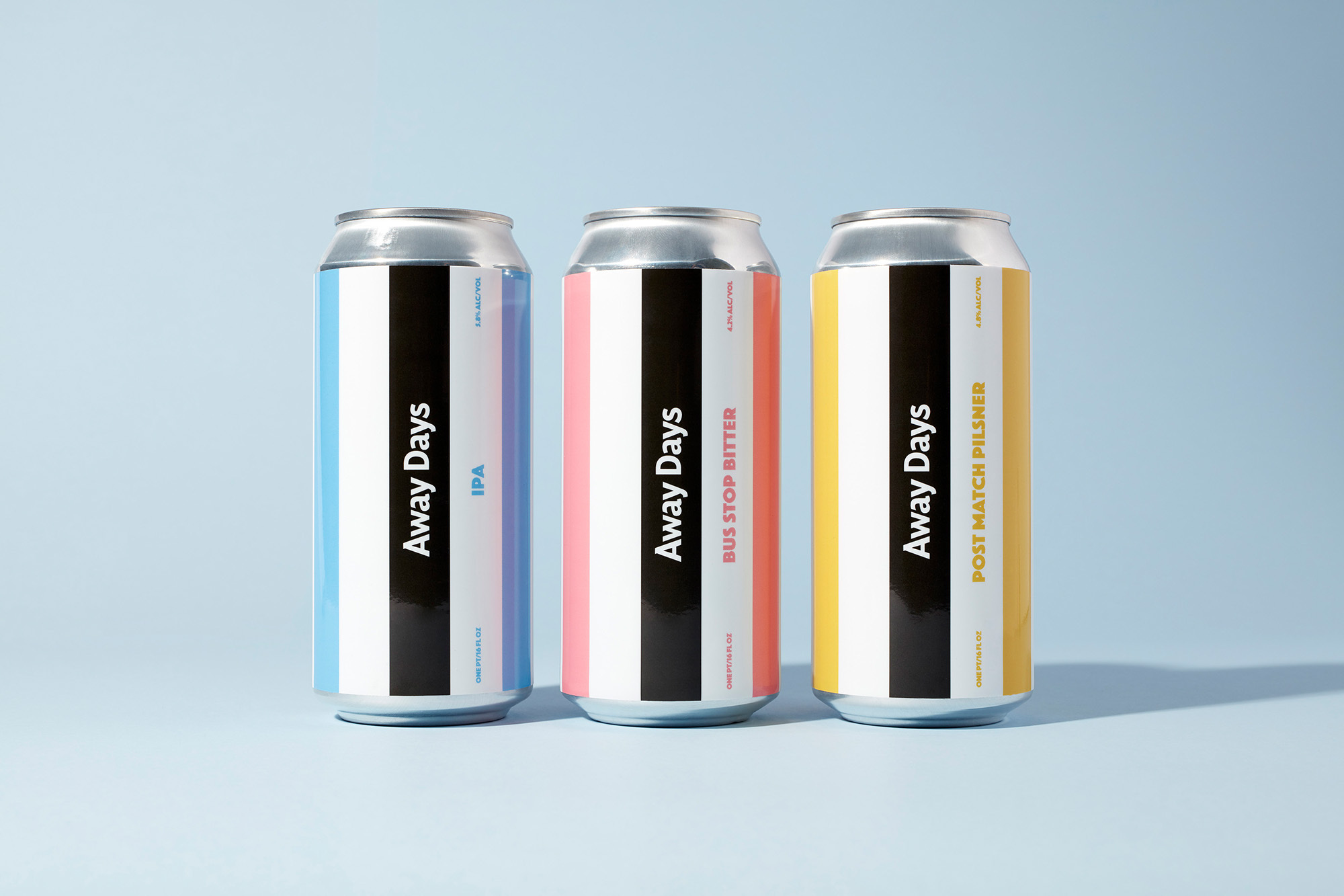 Three colorful Away Days beer cans: blue IPA, pink Bus Stop Bitter, and yellow Post Match Pilsner, arranged on a light blue background.