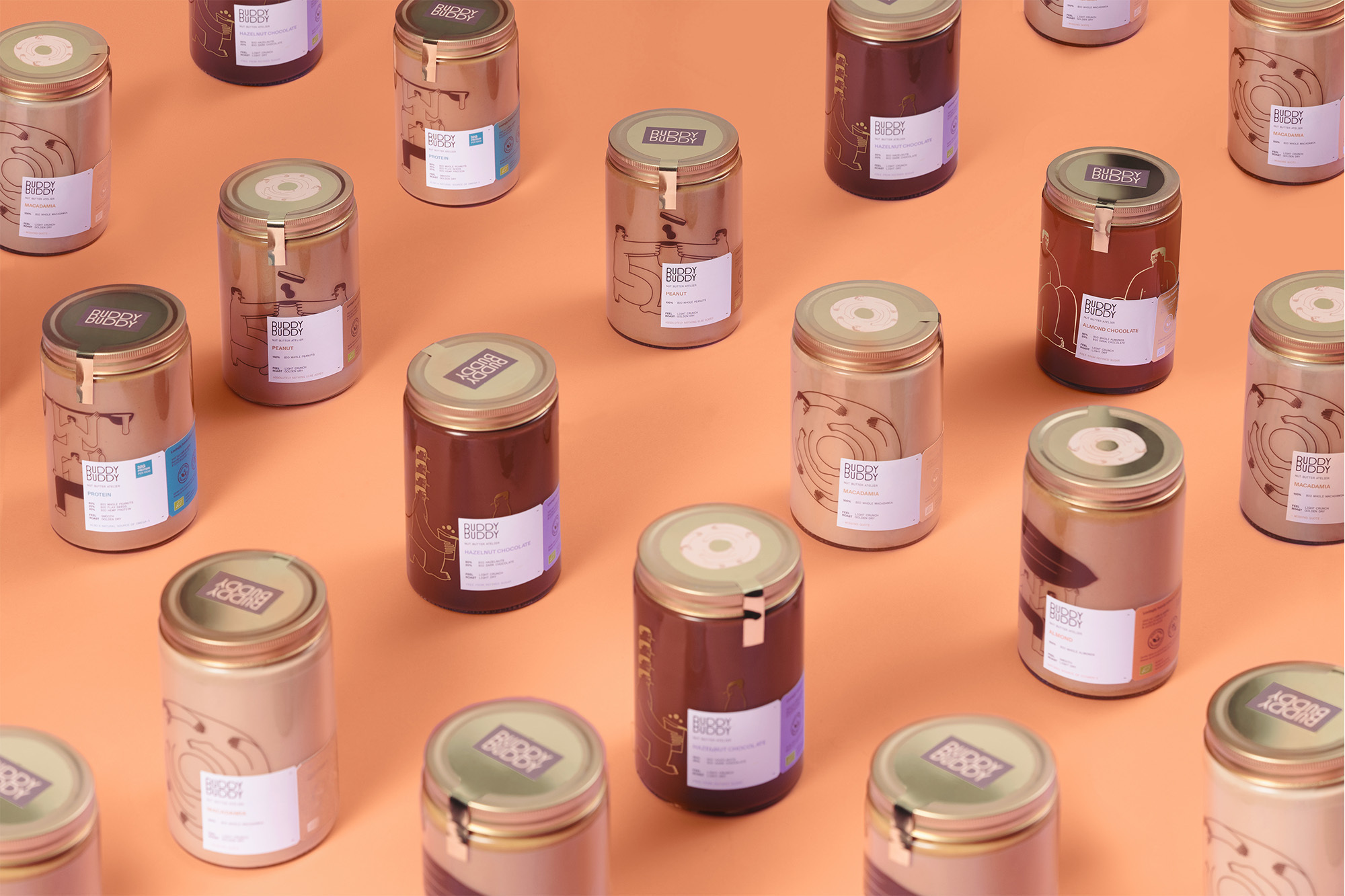 Multiple cans of Buddy Buddy spread, each with a unique flavor indicated by the label, neatly arranged on an orange background.