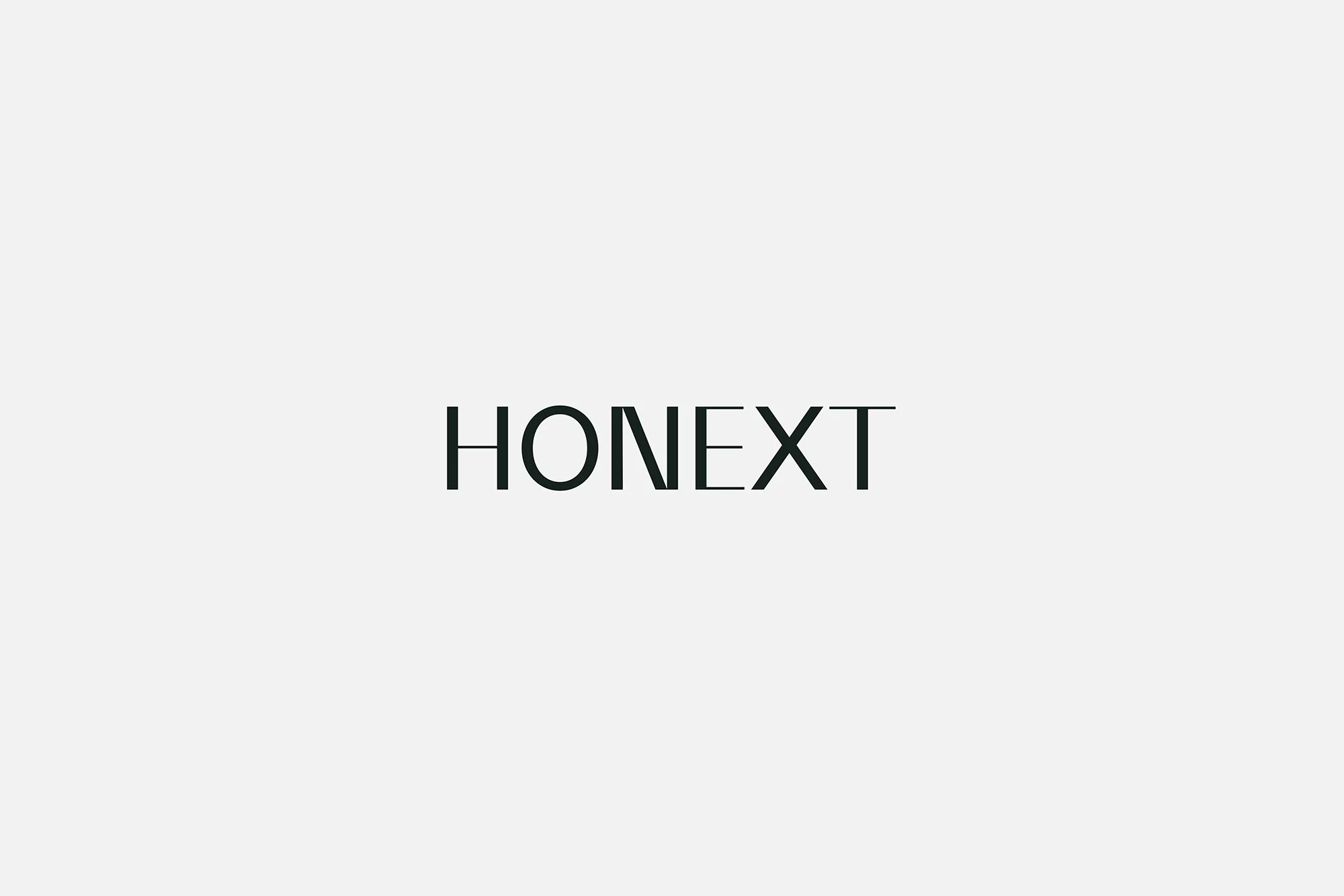 HONEXT logo against a pale background, featuring modern sans-serif font and clean design for brand recognition and corporate communications.