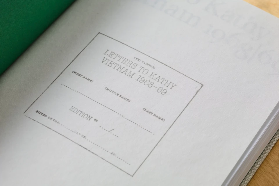 Open book displays title page for “Letters to Kathy Vietnam 1968-69” with spaces for personalizing recipient name and edition number.