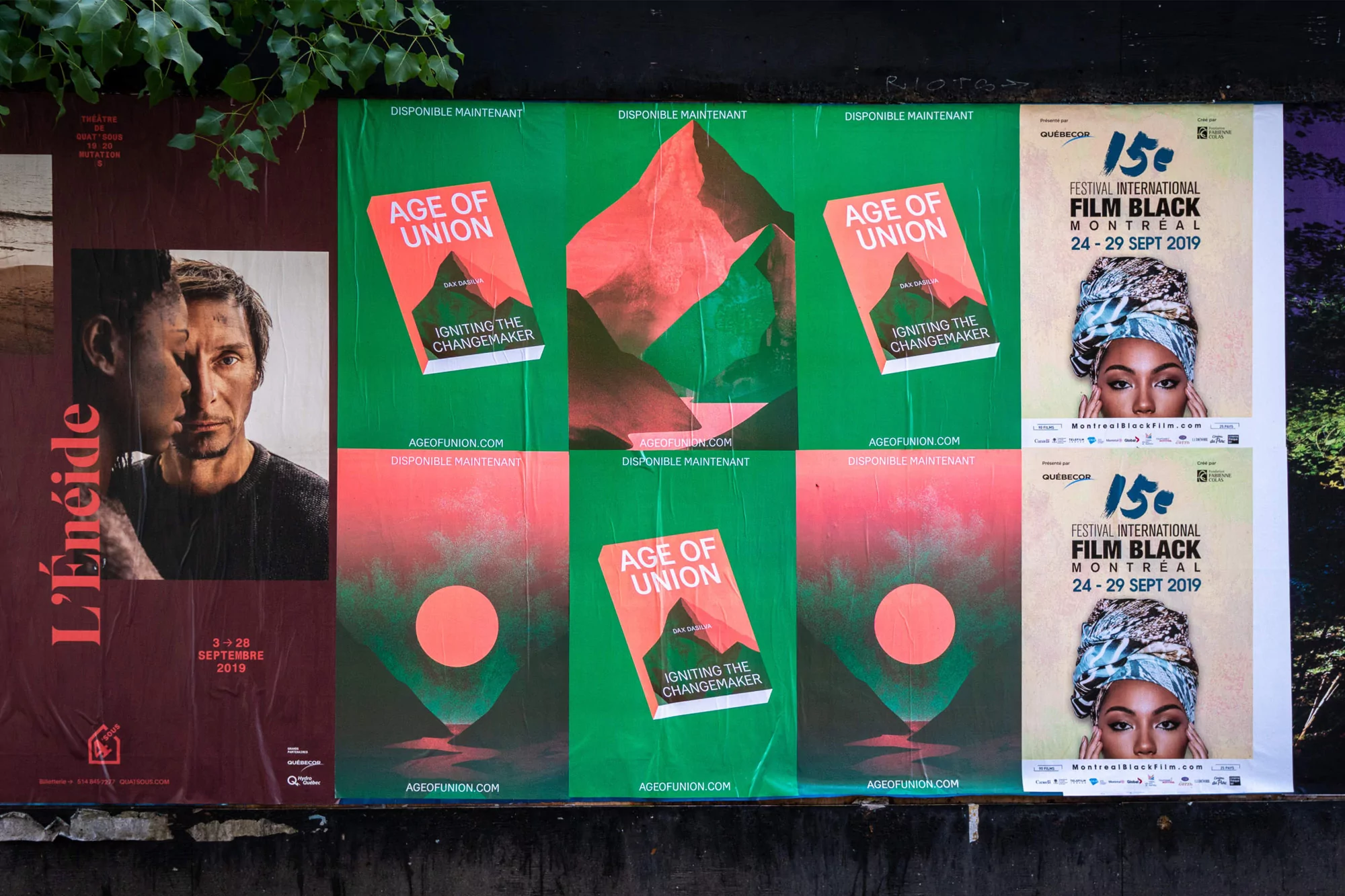 A wall covered in advertisements for a film festival, a book called Age of Union, and an ad for a theatrical performance, all in Montreal.